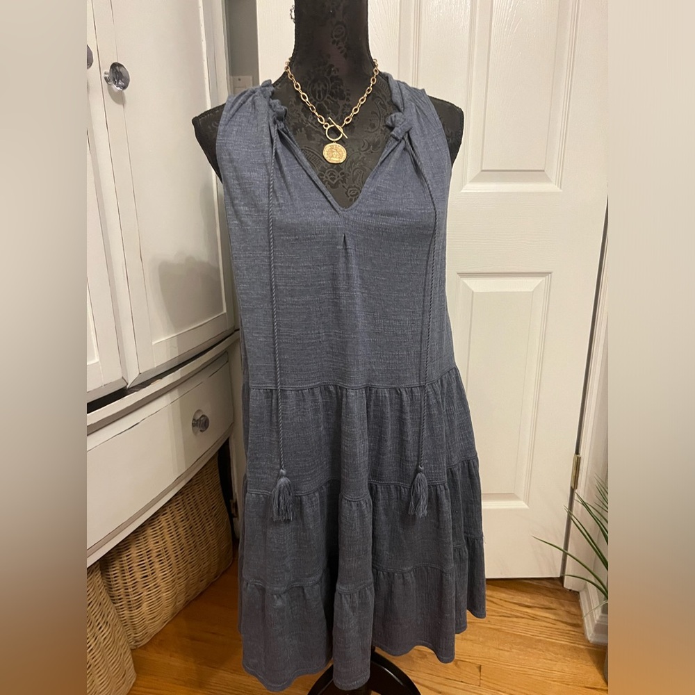 Woman’s blue dress